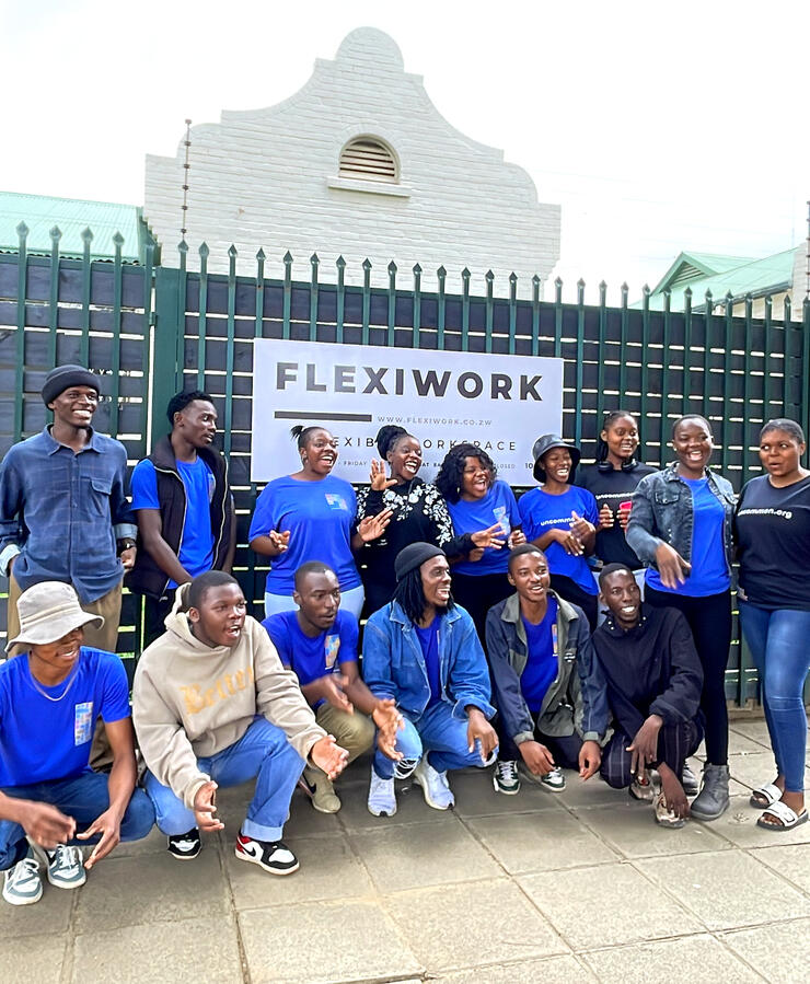 Community image in front of billboard